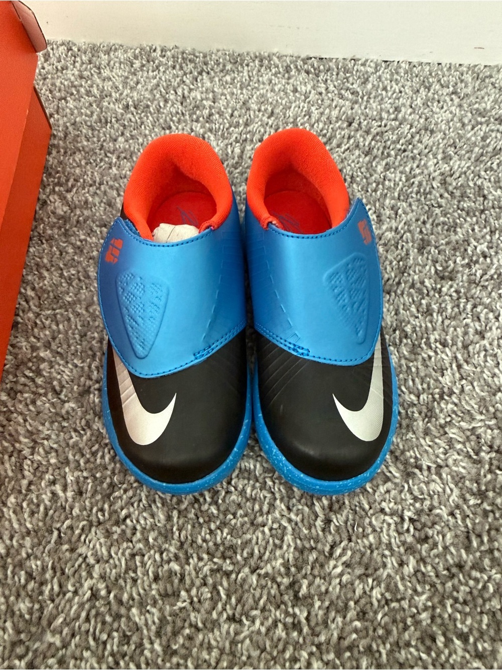 Nike Kids Black and Blue Slip-On Sneakers with Orange Lining
